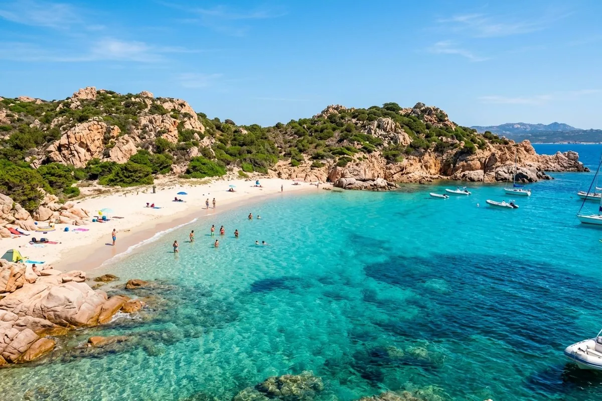 Cala Corsara on Spargi — pale sand, jade-to-blue water and wind-sculpted granite, usually the first and longest swim of the day.